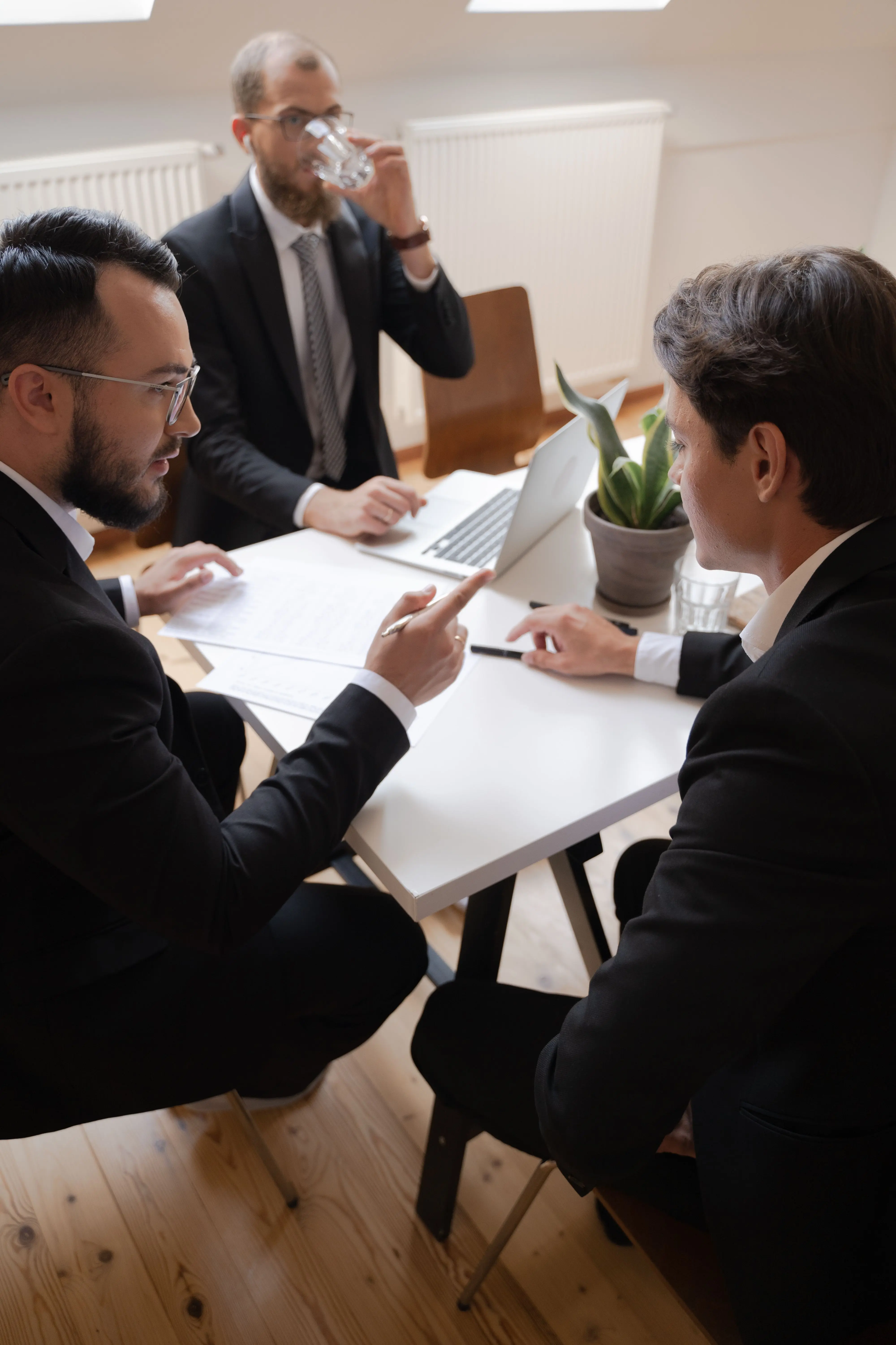 Professional portfolio managers reviewing investment performance